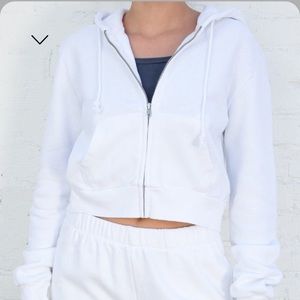 a cropped white jacket